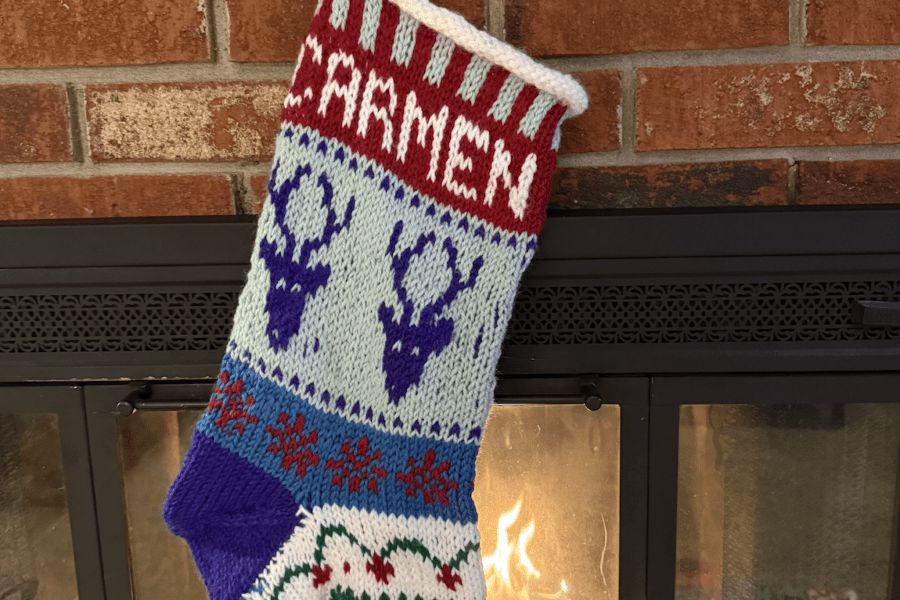 handknit stocking for Carmen with reindeer